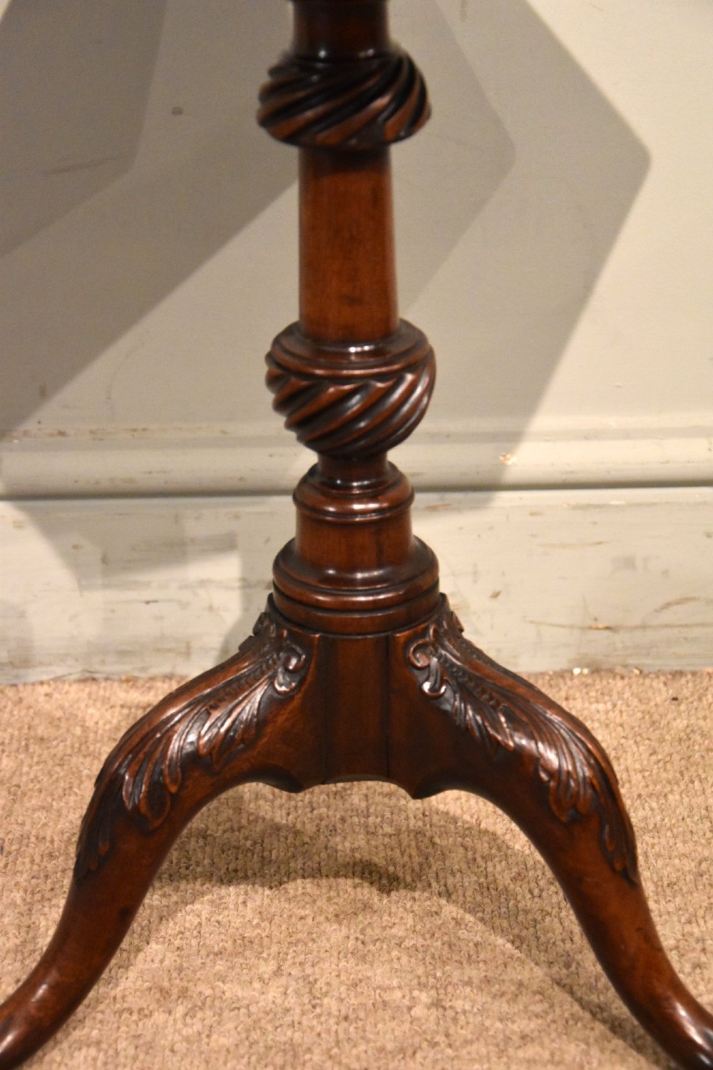 An 18th-century carved mahogany kettle stand with a hexagonal top, turned spiral column, and tripod cabriole legs ending in claw-and-ball feet. View III