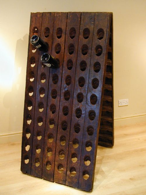 a stunning solid oak wine rack - CATEGORY: ANTIQUE MISCELLANEOUS - DATED 19TH CENTURY