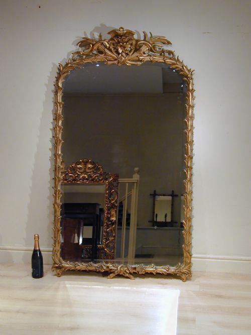 a magnificent giltframed mirror - CATEGORY: ANTIQUE MIRRORS - DATED 1900