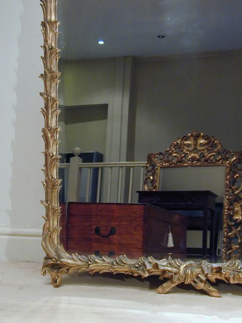 A MAGNIFICENT GILTFRAMED MIRROR - ADDITIONAL PHOTO 3