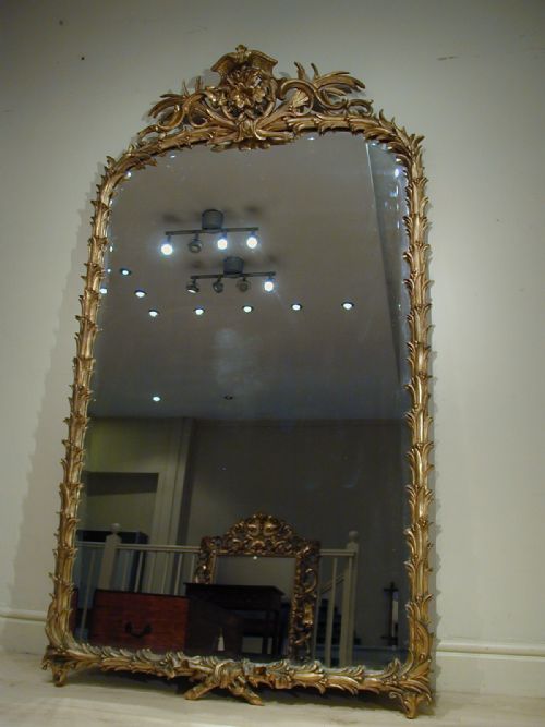 A MAGNIFICENT GILTFRAMED MIRROR - ADDITIONAL PHOTO 4