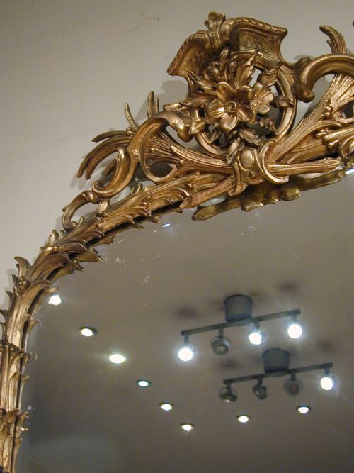 A MAGNIFICENT GILTFRAMED MIRROR - ADDITIONAL PHOTO 6