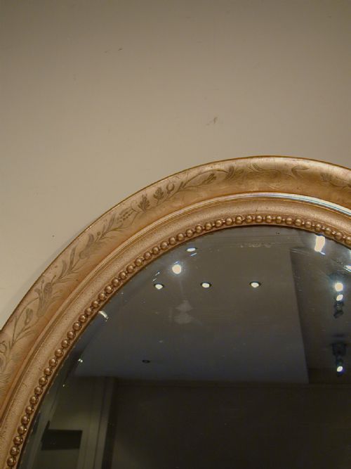 AN IMPRESSIVELY LARGE OVAL WALL MIRROR - ADDITIONAL PHOTO 8