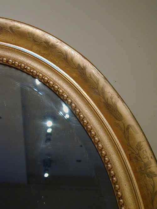 AN IMPRESSIVELY LARGE OVAL WALL MIRROR - ADDITIONAL PHOTO 9