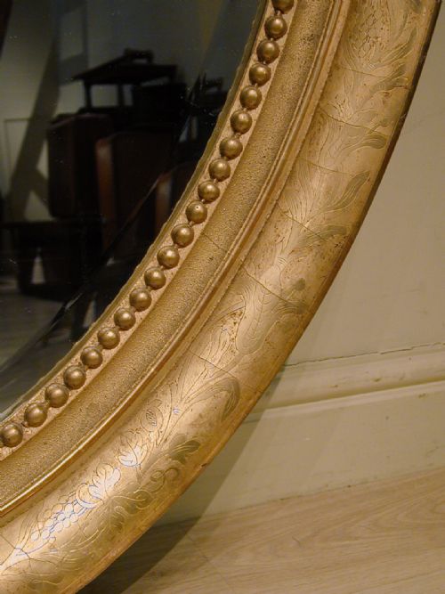 AN IMPRESSIVELY LARGE OVAL WALL MIRROR - ADDITIONAL PHOTO 10