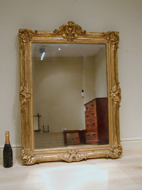 an impressive giltframe mirror - CATEGORY: ANTIQUE MIRRORS - DATED 1870