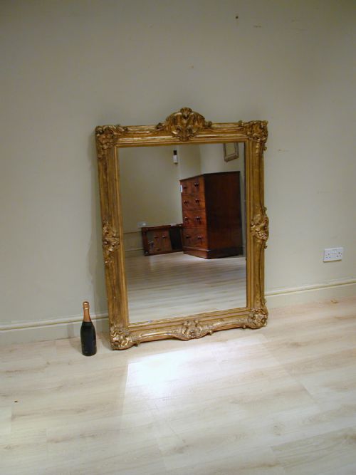 AN IMPRESSIVE GILTFRAME MIRROR - ADDITIONAL PHOTO 2