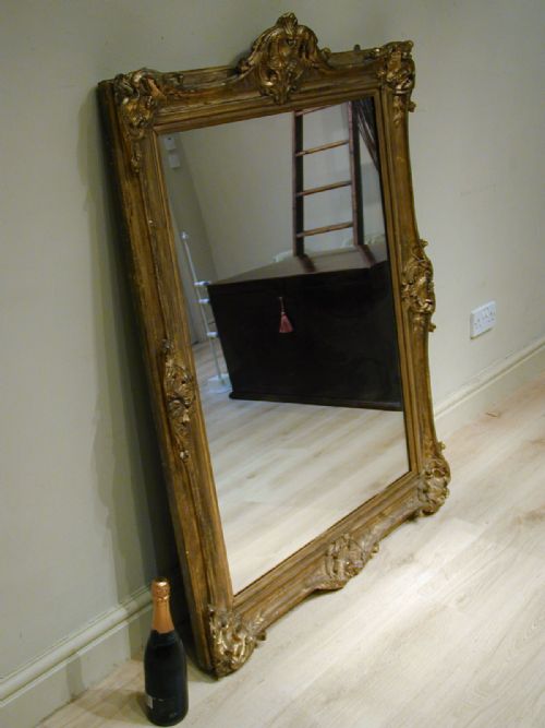 AN IMPRESSIVE GILTFRAME MIRROR - ADDITIONAL PHOTO 8