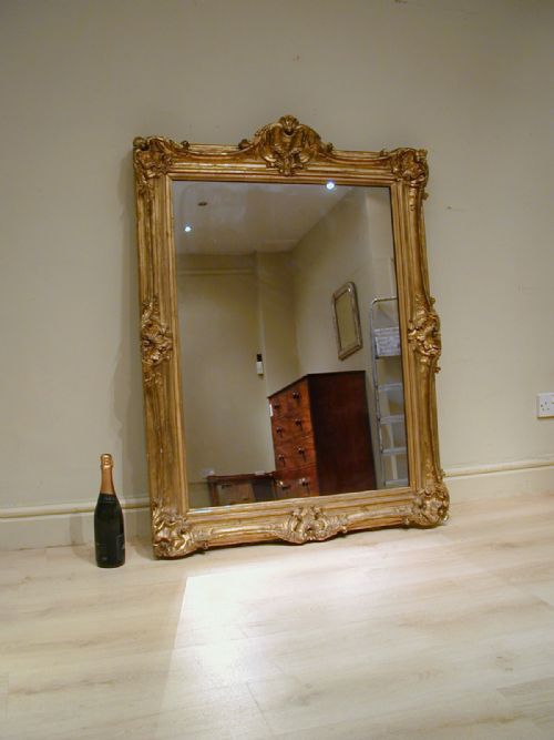AN IMPRESSIVE GILTFRAME MIRROR - ADDITIONAL PHOTO 10