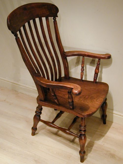 A GENEROUSLY PROPORTIONED WINDSOR ARMCHAIR - ADDITIONAL PHOTO 9
