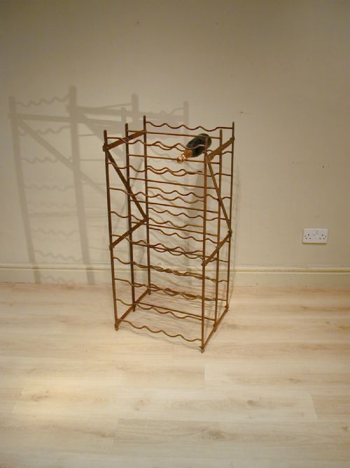 A DOUBLESIDED VINTAGE WINE RACK - ADDITIONAL PHOTO 1