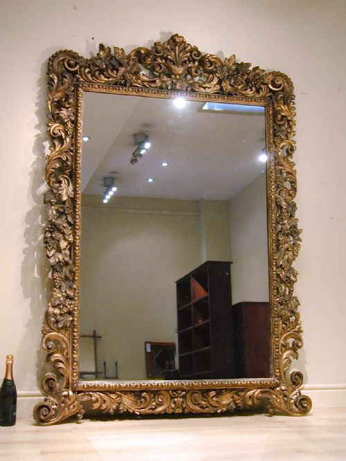 A LARGE GILTWOOD MIRROR OF EXCEPTIONAL QUALITY - ADDITIONAL PHOTO 7