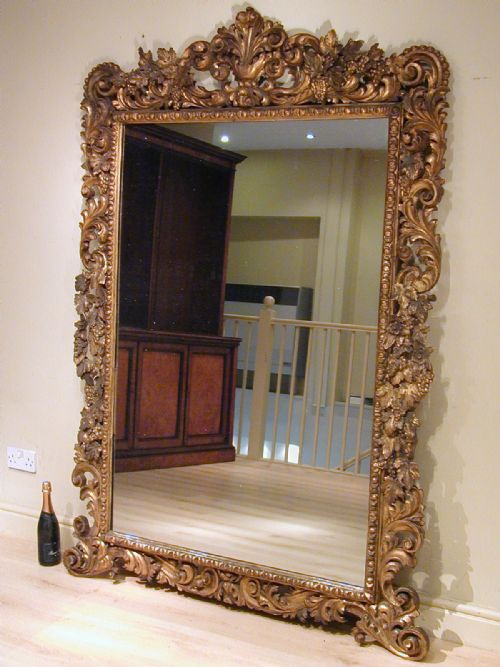 A LARGE GILTWOOD MIRROR OF EXCEPTIONAL QUALITY - ADDITIONAL PHOTO 12