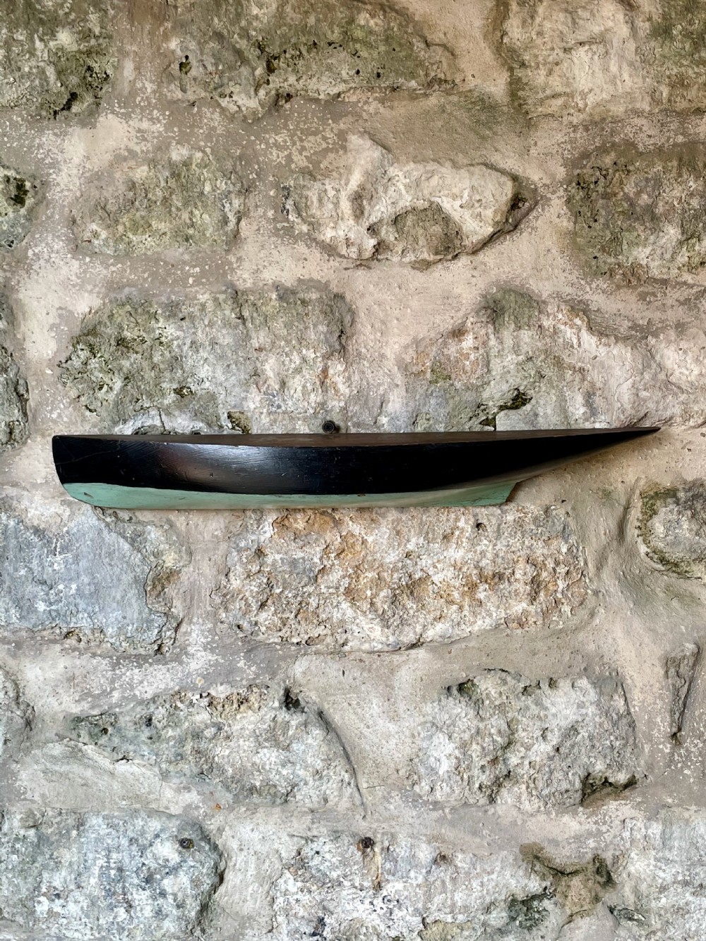 Early 20th century half-hull yacht model