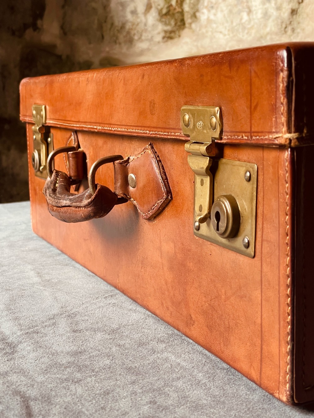Luggage: a top quality leather suitcase View III