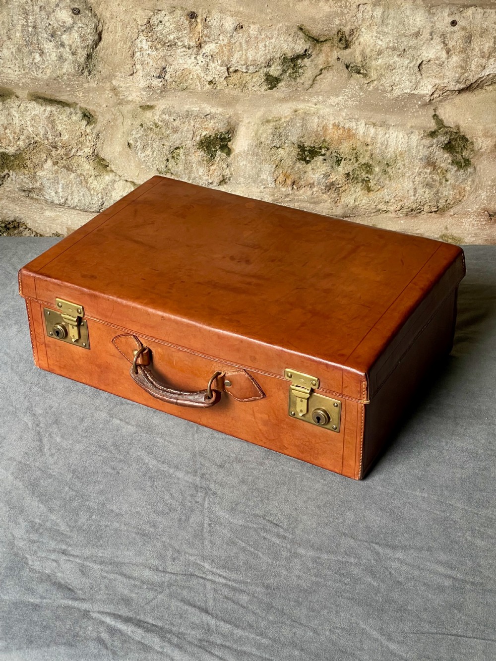 Luggage: a top quality leather suitcase