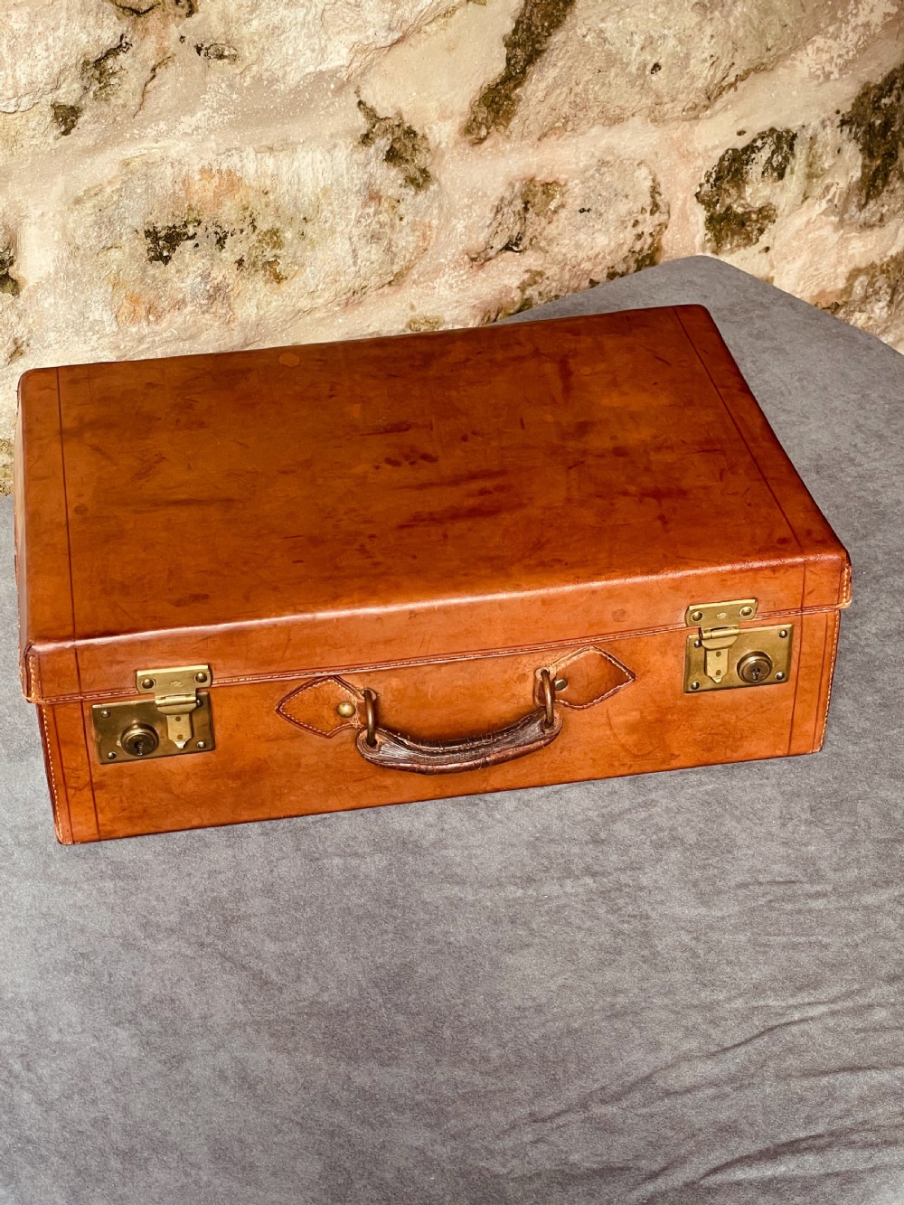 Luggage: a top quality leather suitcase View IV