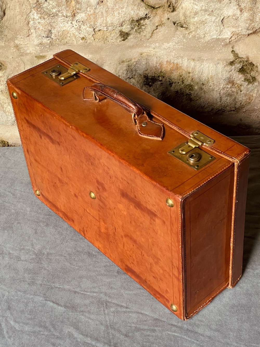 Luggage: a top quality leather suitcase View VII