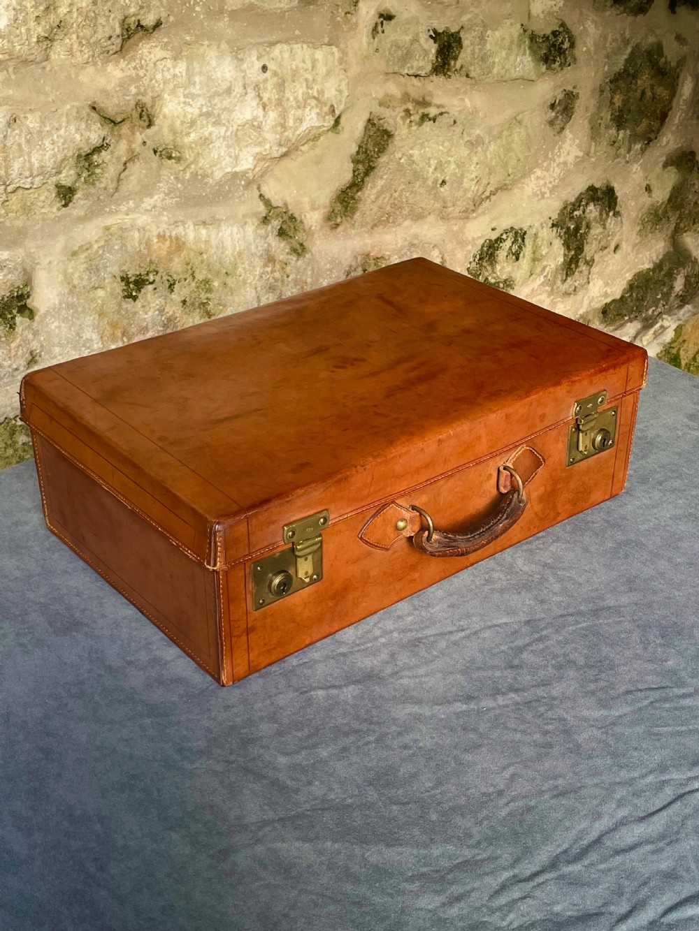 Luggage: a top quality leather suitcase View XII