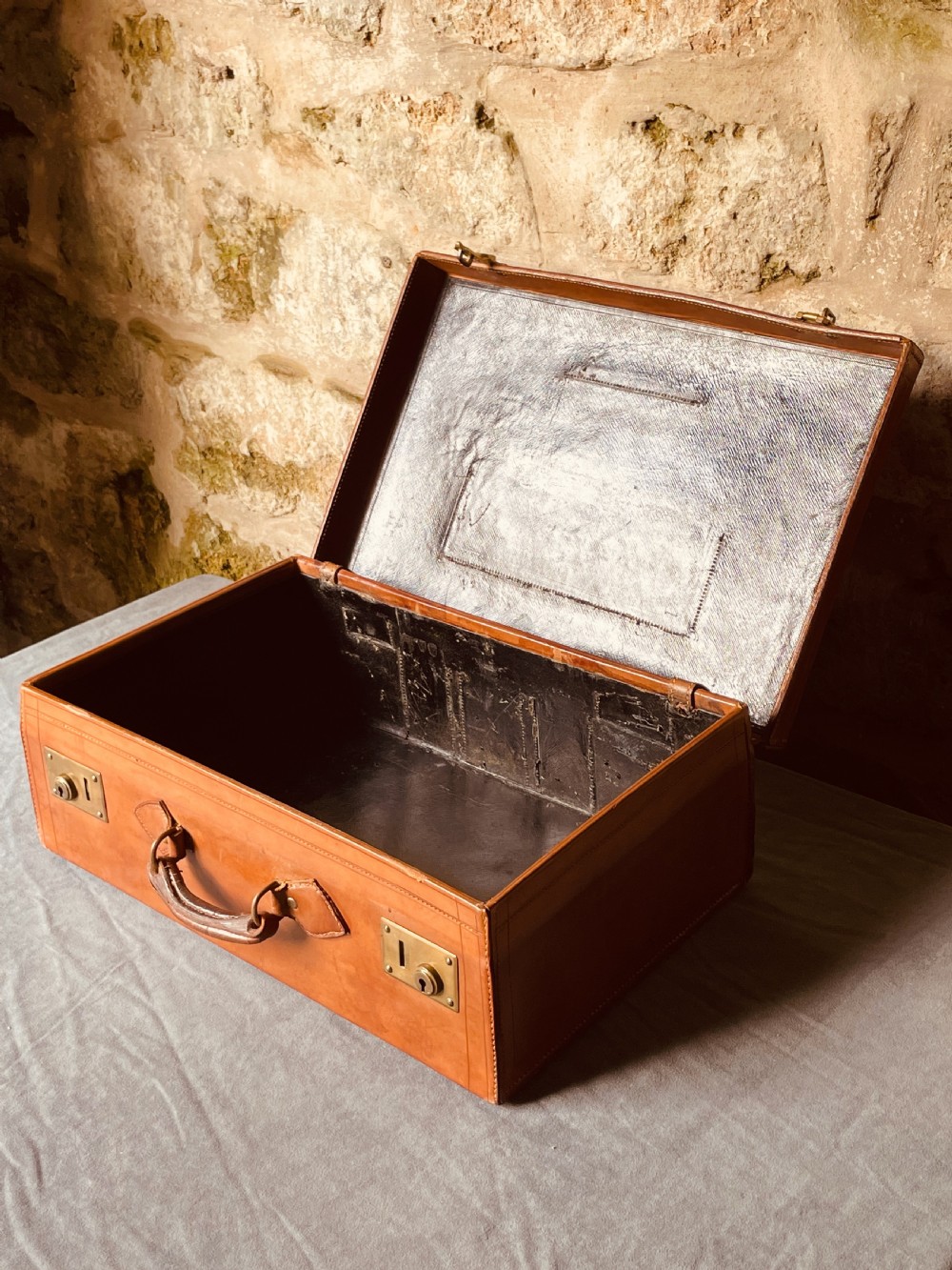 Luggage: a top quality leather suitcase View XVII