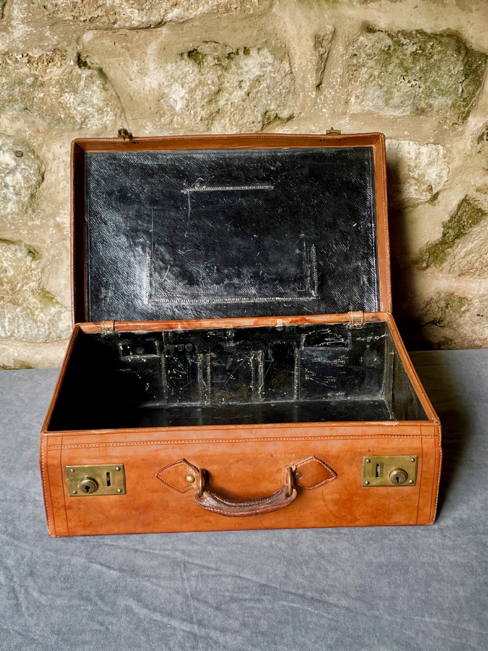 Luggage: a top quality leather suitcase View XVIII