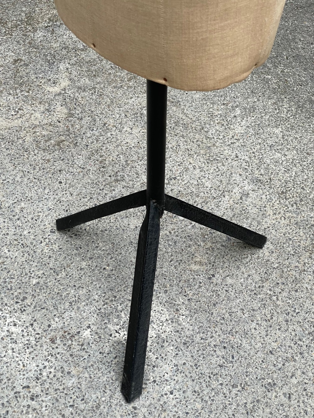 A fabric-covered female tailors dummy torso featuring stitched neutral linen upholstery and a dark turned neck finial. View VIII