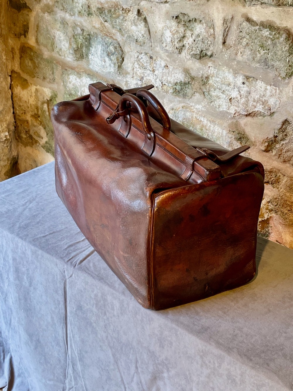 Leather luggage: a large Gladstone bag