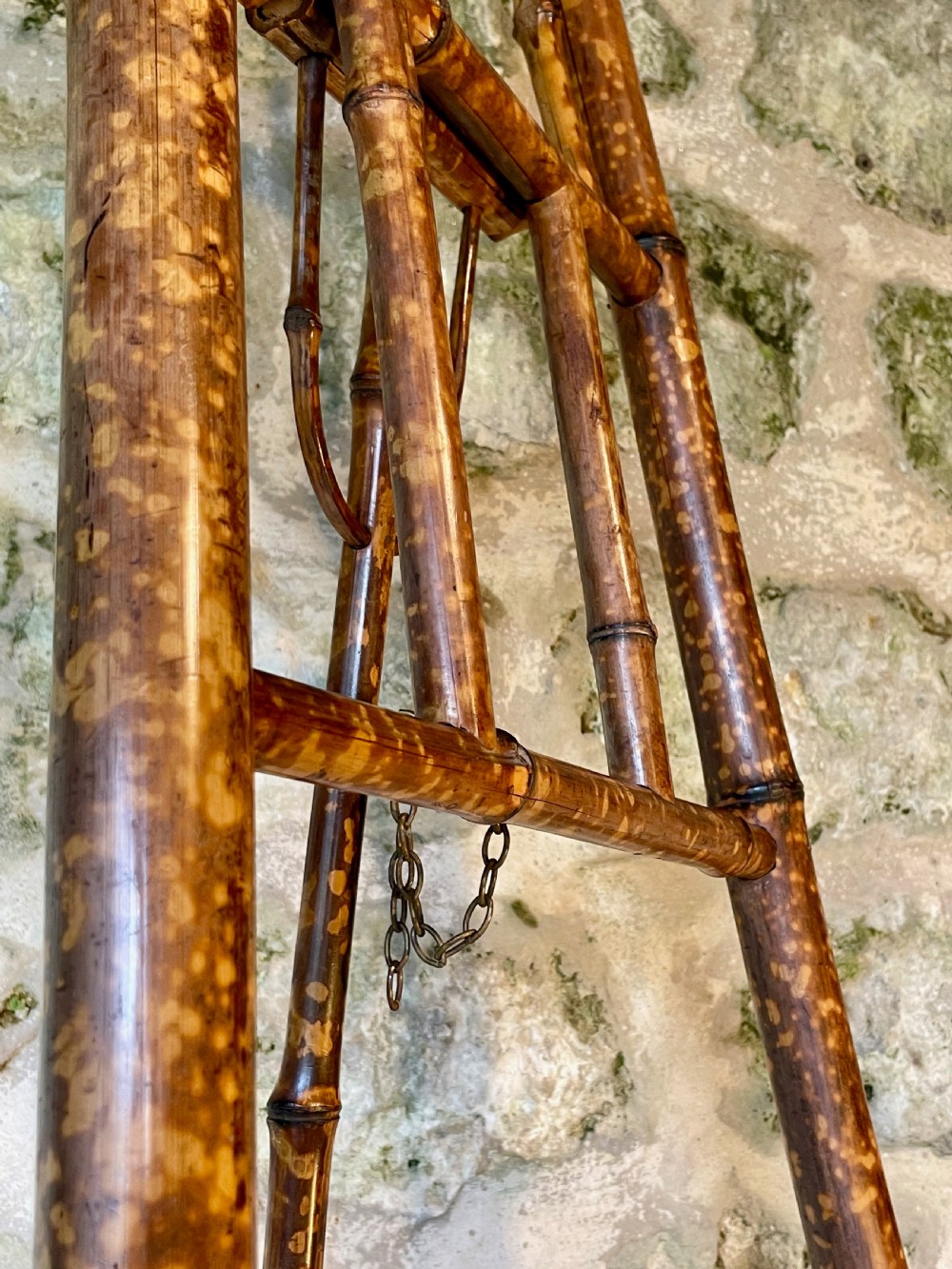 A tall Victorian freestanding easel crafted from mottled brown bamboo with cross-bracing and support pegs. View XIII