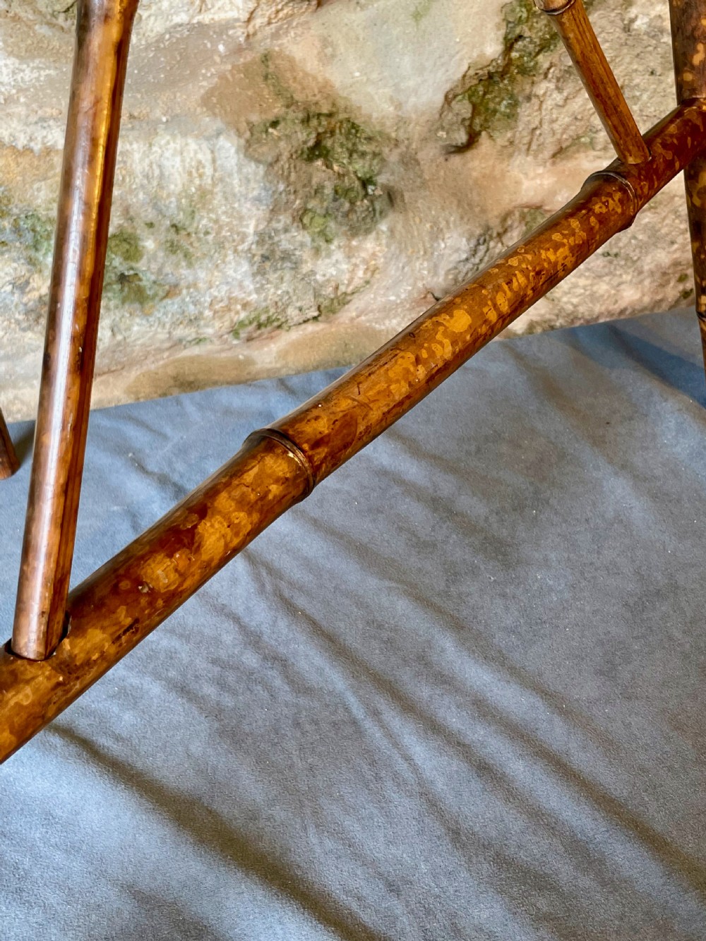 A tall Victorian freestanding easel crafted from mottled brown bamboo with cross-bracing and support pegs. View XIV