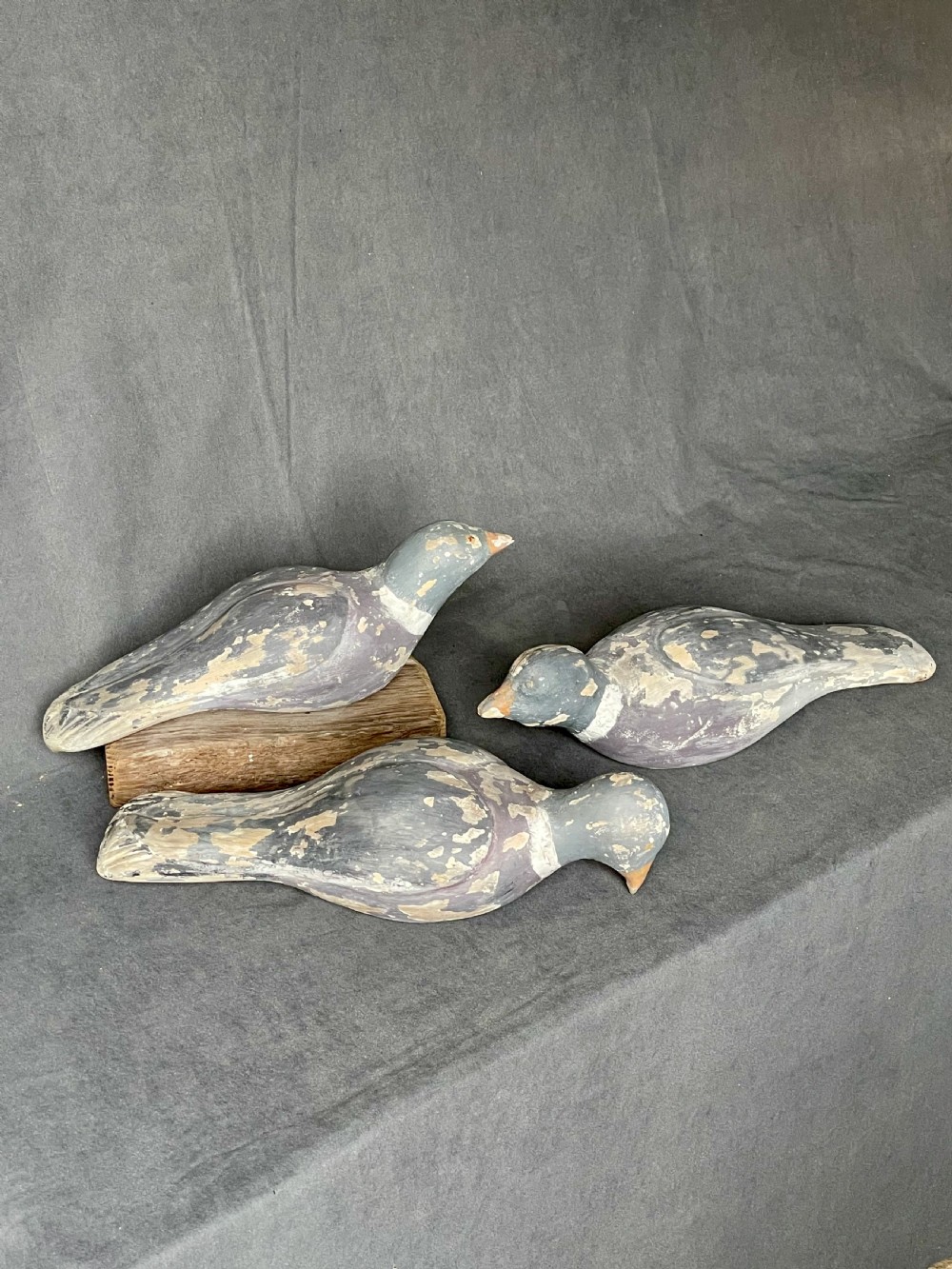 Three decoy pigeon figures View II