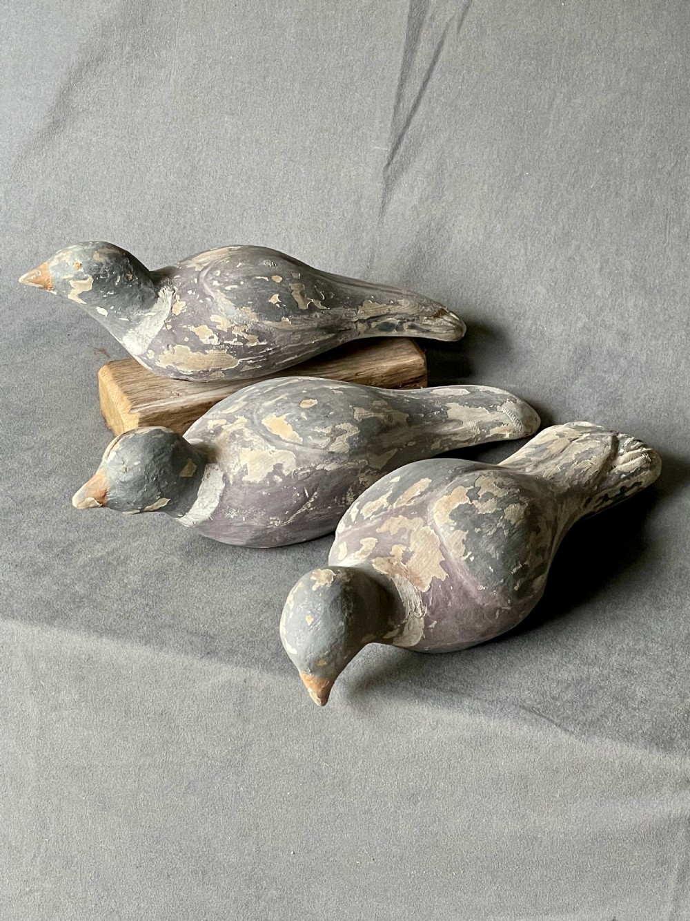 Three decoy pigeon figures View IV