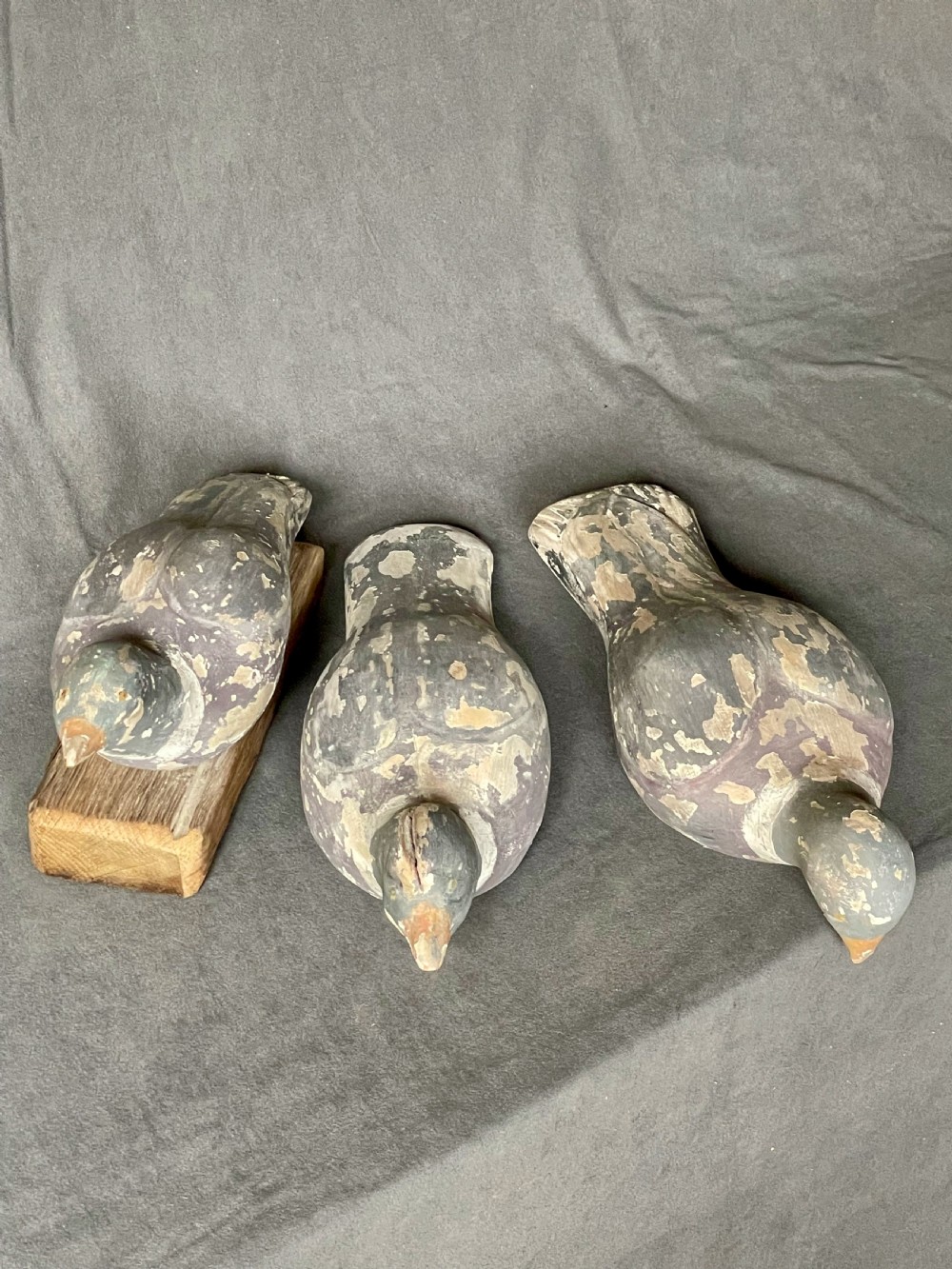 Three decoy pigeon figures View VII