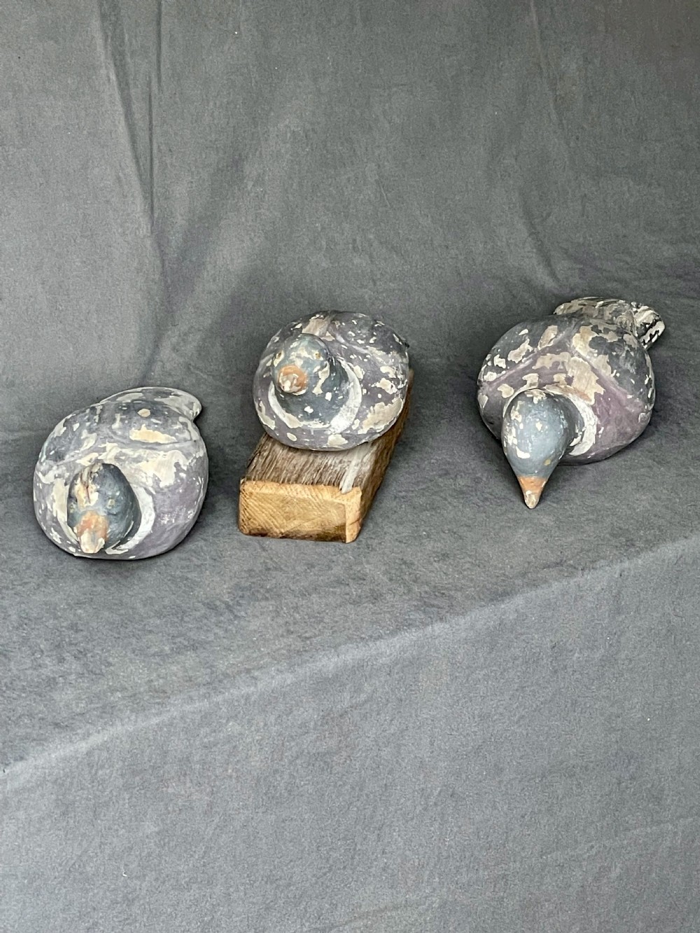 Three decoy pigeon figures View XVII