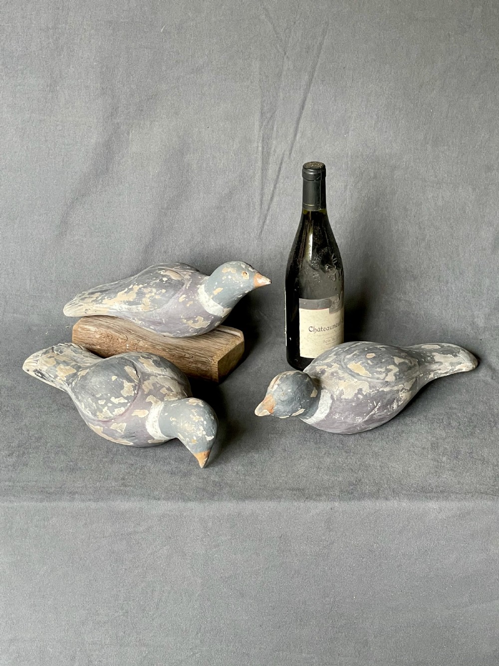 Three decoy pigeon figures View XIX