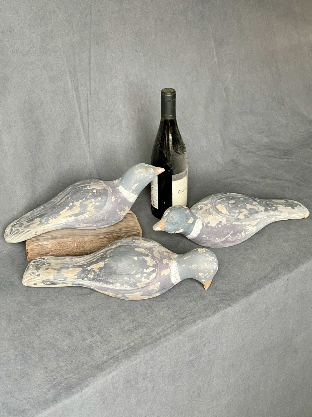 Three decoy pigeon figures View XXIII