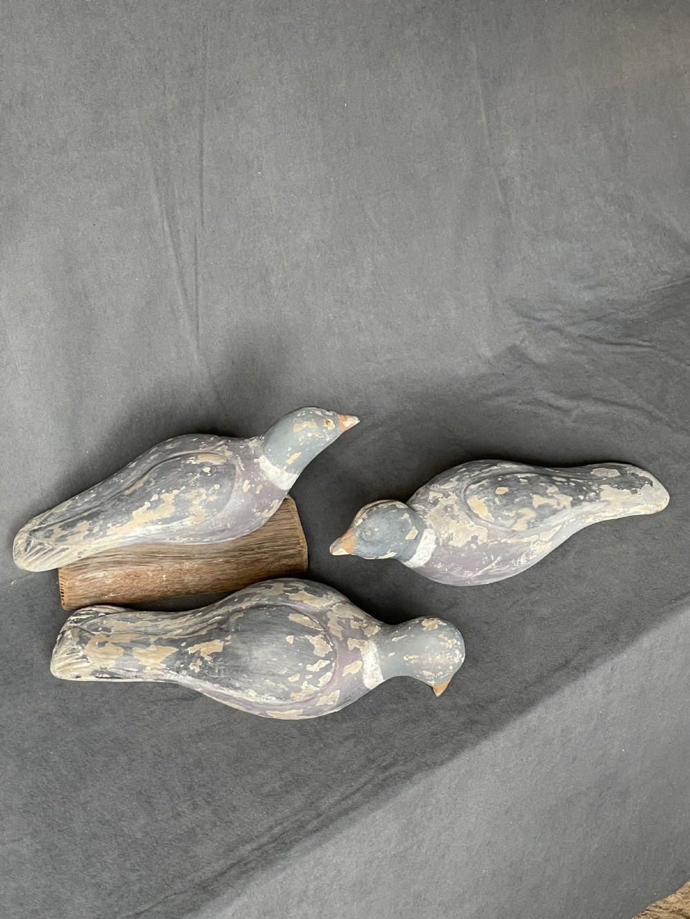 Three decoy pigeon figures View XXIV