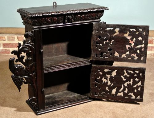 fig 1. Early 17th Century Oak Livery Cupboard Carved with Cherubim