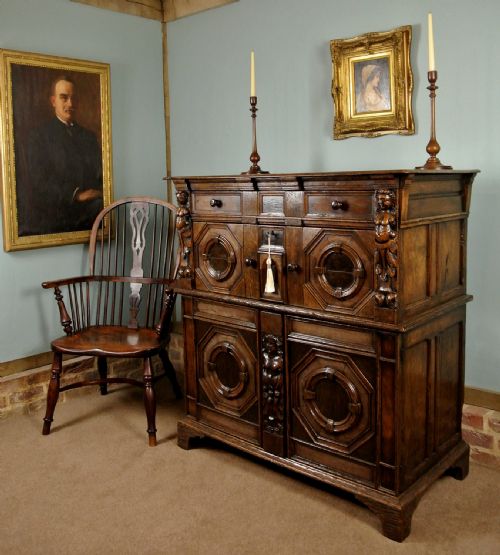 fig 1. Monumental Early Oak, Elm and Walnut Chest with Figural Carvings