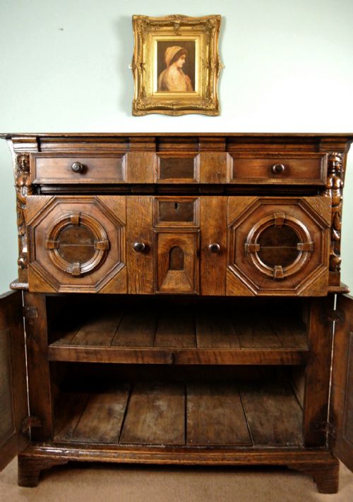 fig 2. Monumental Early Oak, Elm and Walnut Chest with Figural Carvings