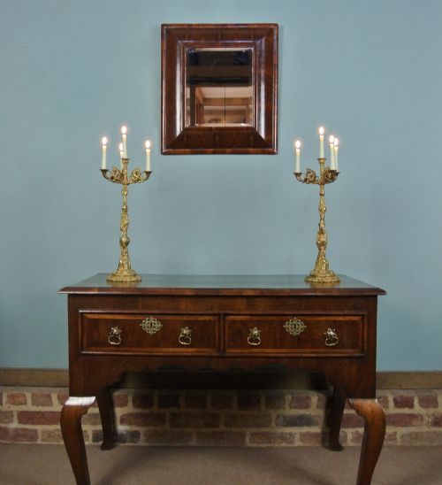 fig 1. William and Mary Walnut Oyster Veneer Cushion Framed Mirror c. 1690