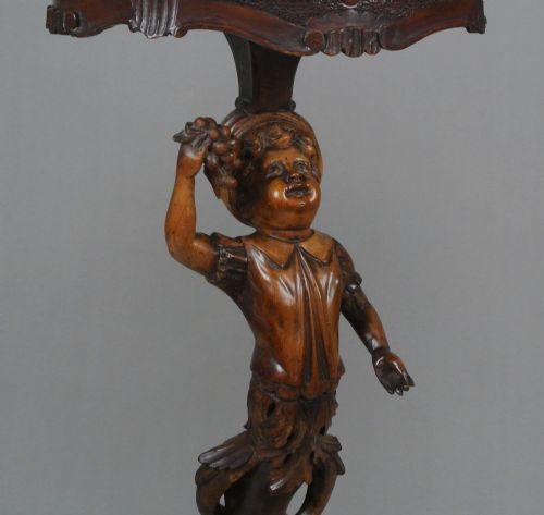 fig 2. Pair of 19th Century Black Forest Carved Walnut Torcheres c. 1860