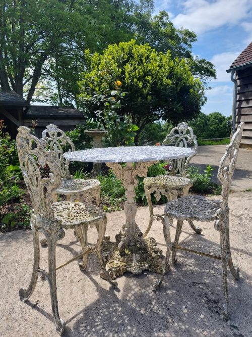 fig 1. Four Elegant Victorian Cast Iron Garden Chairs c. 1880