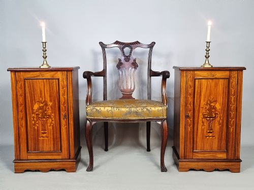 fig 1. A pair of late Victorian rosewood bedside cupboards featuring delicate floral marquetry urn inlays on single panelled doors.