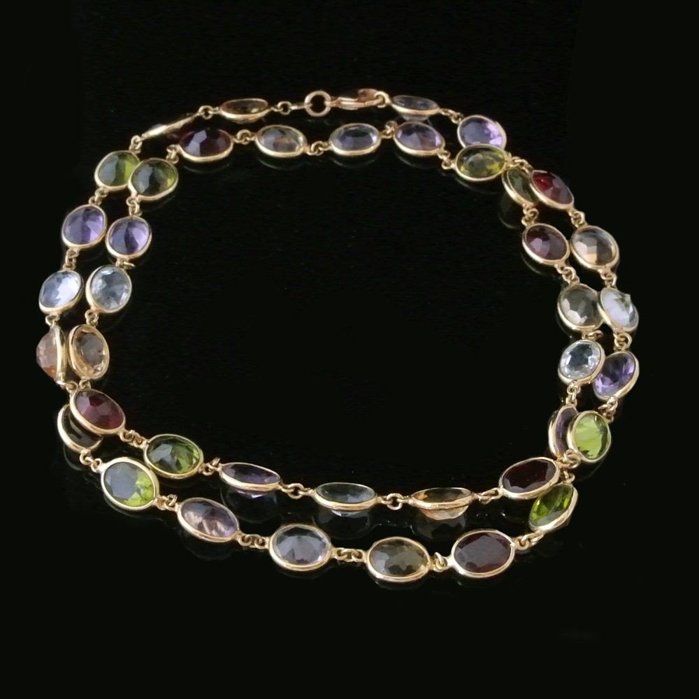 Italian 18kt Gold and 50 Carats of Natural Gemstones in a Suffragette Design Necklace 