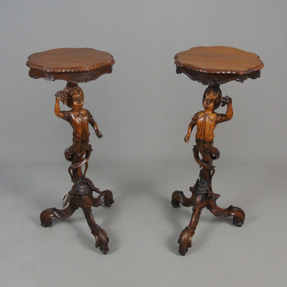 Pair of 19th Century Black Forest Carved Walnut Torcheres c. 1860