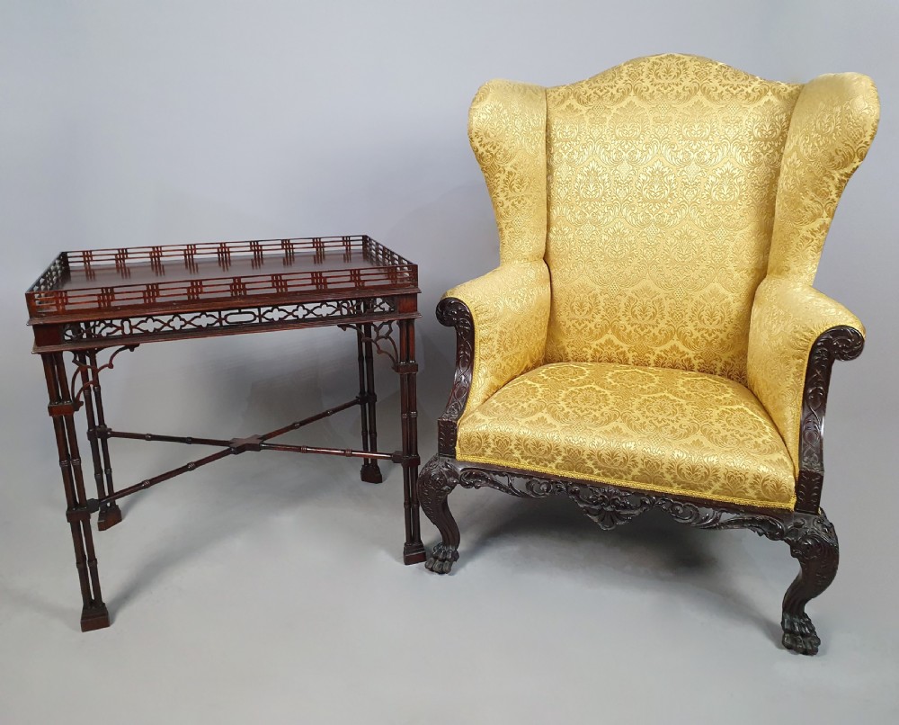 A dark padauk wood silver table featuring a rectangular top surrounded by a lattice gallery rim, supported by pierced Gothic arches and cluster column legs. View II