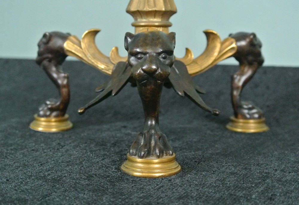 A pair of late nineteenth-century French ormolu and patinated bronze multi-light candelabra topped with crane figures and hung with small gilt chains. View IX