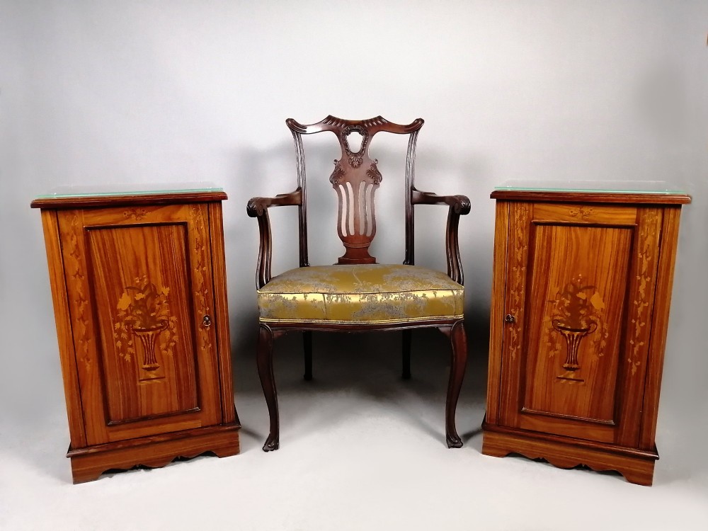 A matching pair of late 19th-century rosewood bedside cabinets featuring detailed floral marquetry inlays on the central door panels. View VIII