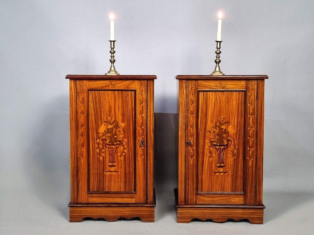 A pair of late Victorian rosewood bedside cupboards featuring central floral urn marquetry inlays on single-panel doors and plinth bases. View III