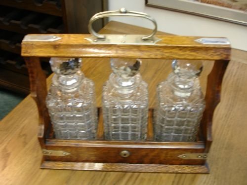 Edwardian Medium Oak 3 Bottle Tantalus.